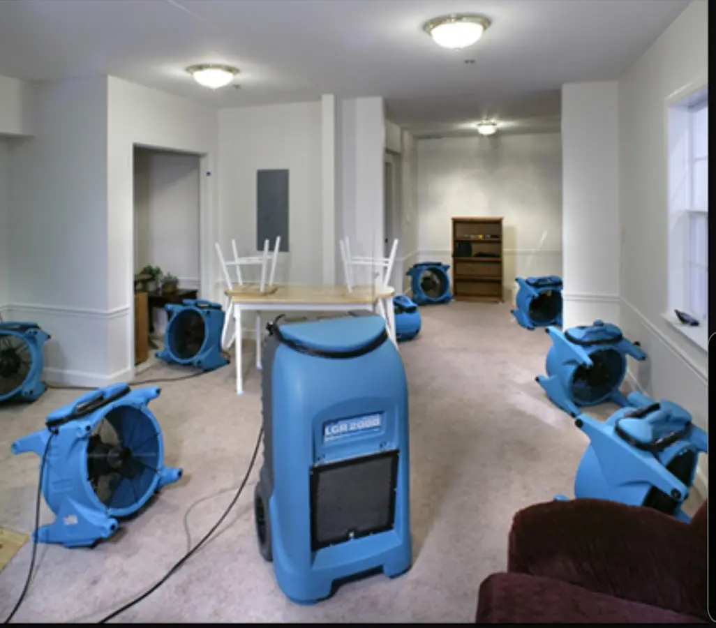 Air movers and dehumidifier setup for Water Damage Restoration in Middleton